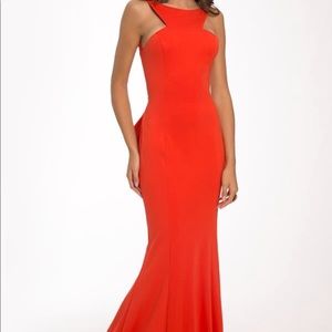 Red open back Jovani dress with ruffles